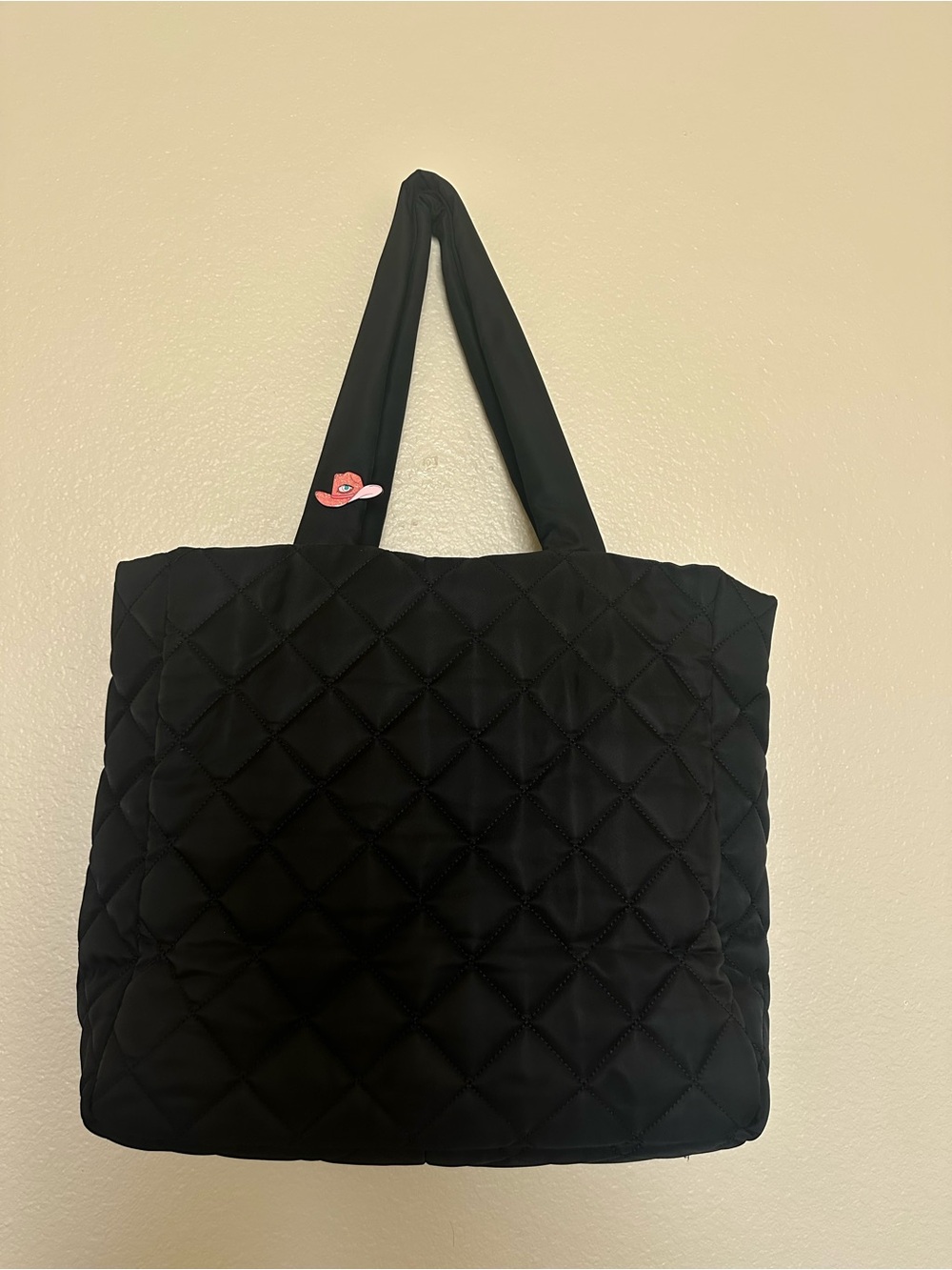 Black Quilted Tote Bag with pin